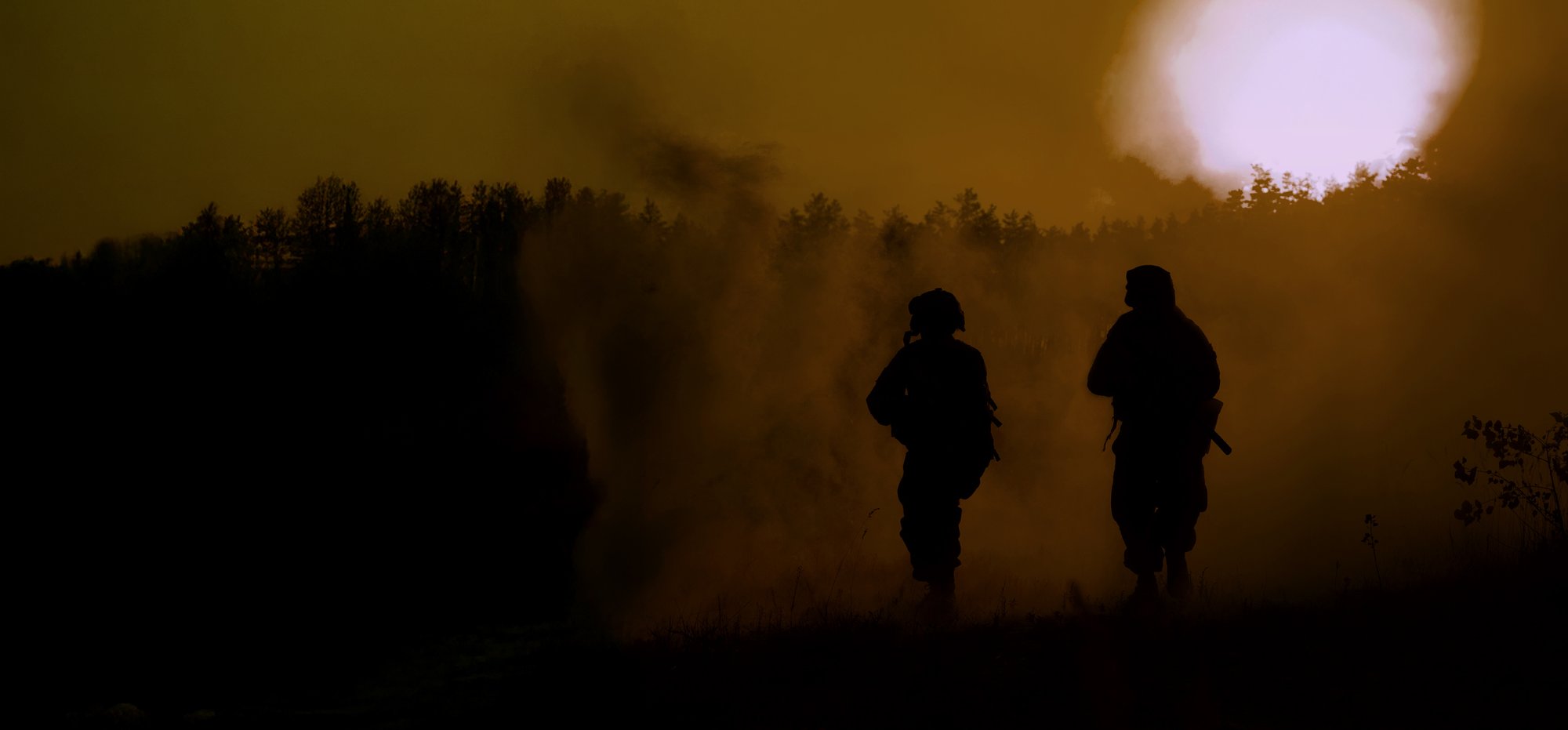 Soliders-at-night-with-orange-sky